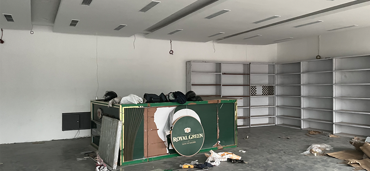 Woodnote Brand Shop Bahadurgarh retail liquor store interior by Next BC